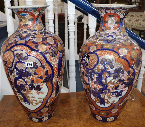 A large pair of Imari baluster vases 61.5cm (a.f.)